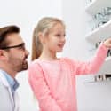 kids eye doctor help girl choose children's glasses